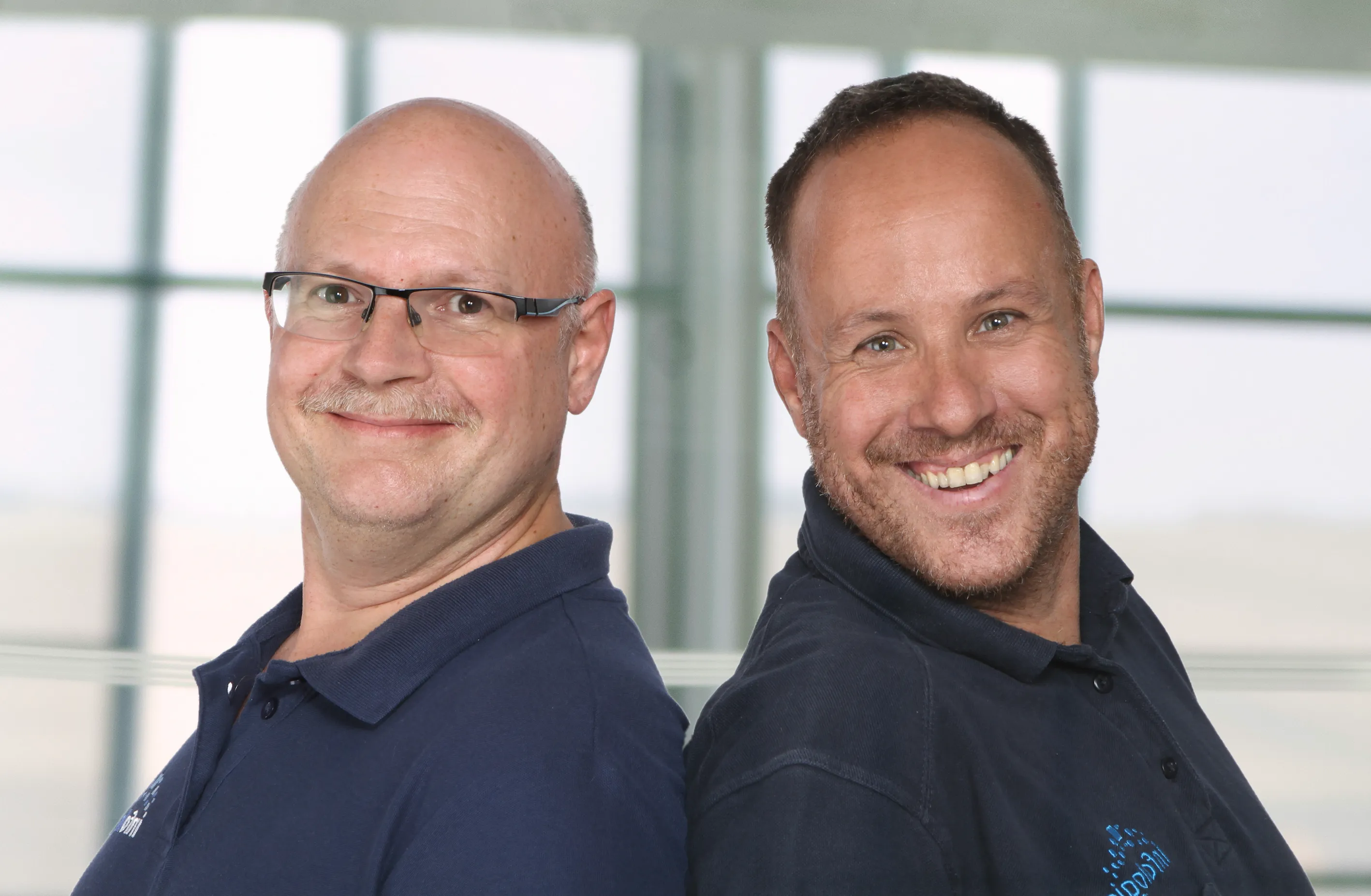 Wolfgang Perzl und René Schiebeck, Geschäftsführung der infologistix